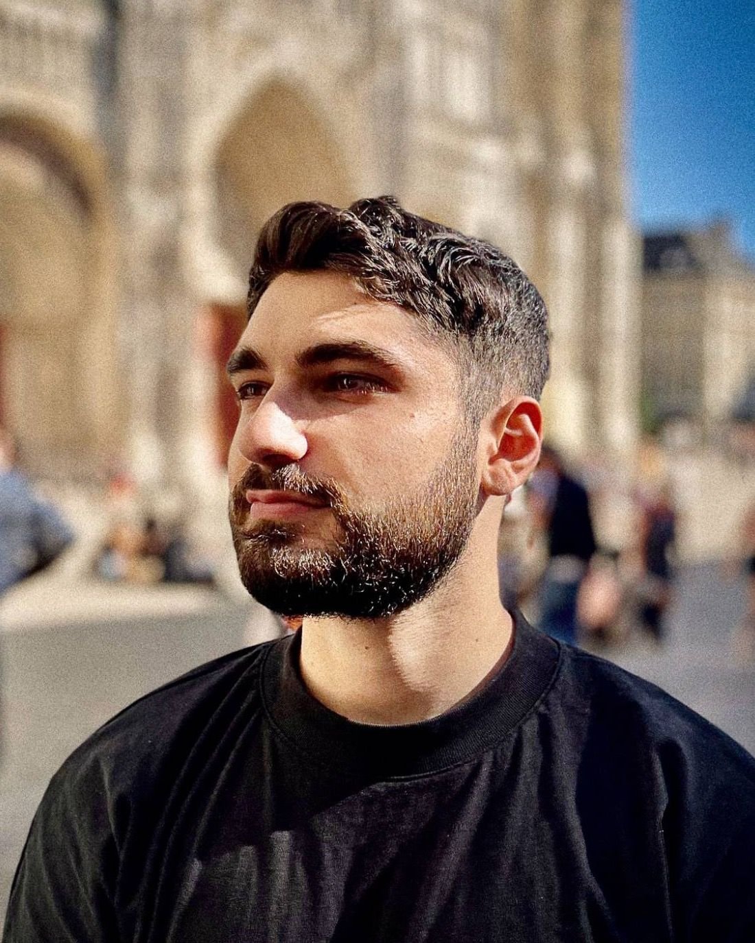 Charles-Antoine Alba in front of a cathedral